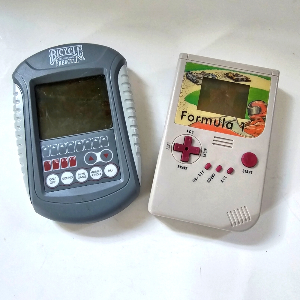 Vintage Formula 1 electronic race game hand held Bicycle Free cell Retro gaming